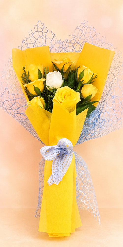 Yellow rose bouquet with white rose, greenery, yellow wrapping, and white ribbon